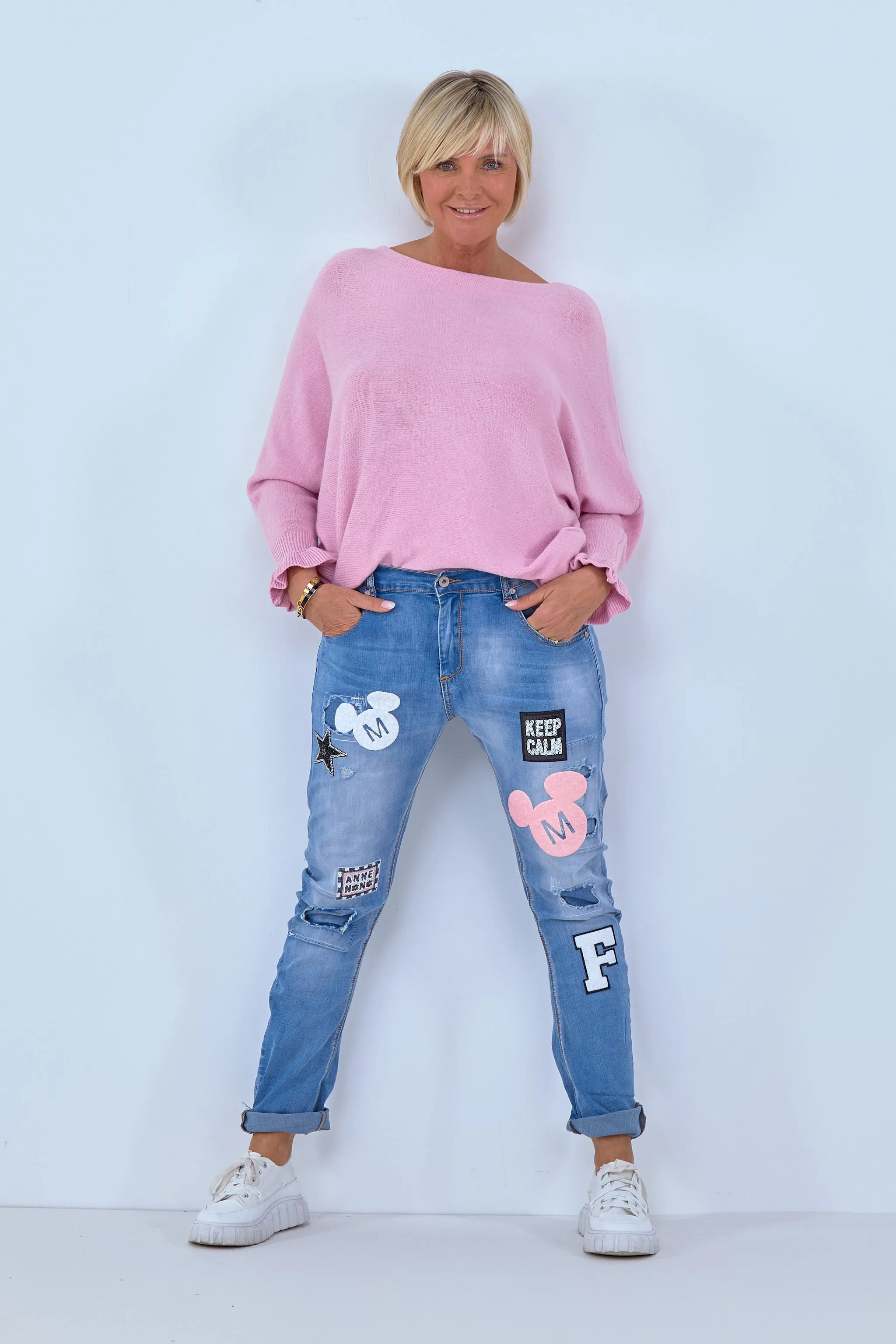 Jeans mit Flock und Badges, denim